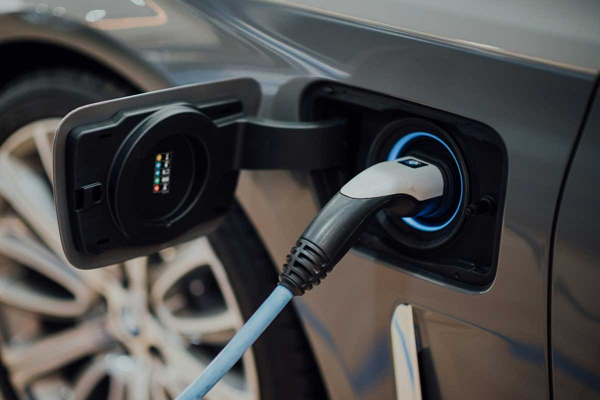 Close up of an electric vehicle being charged