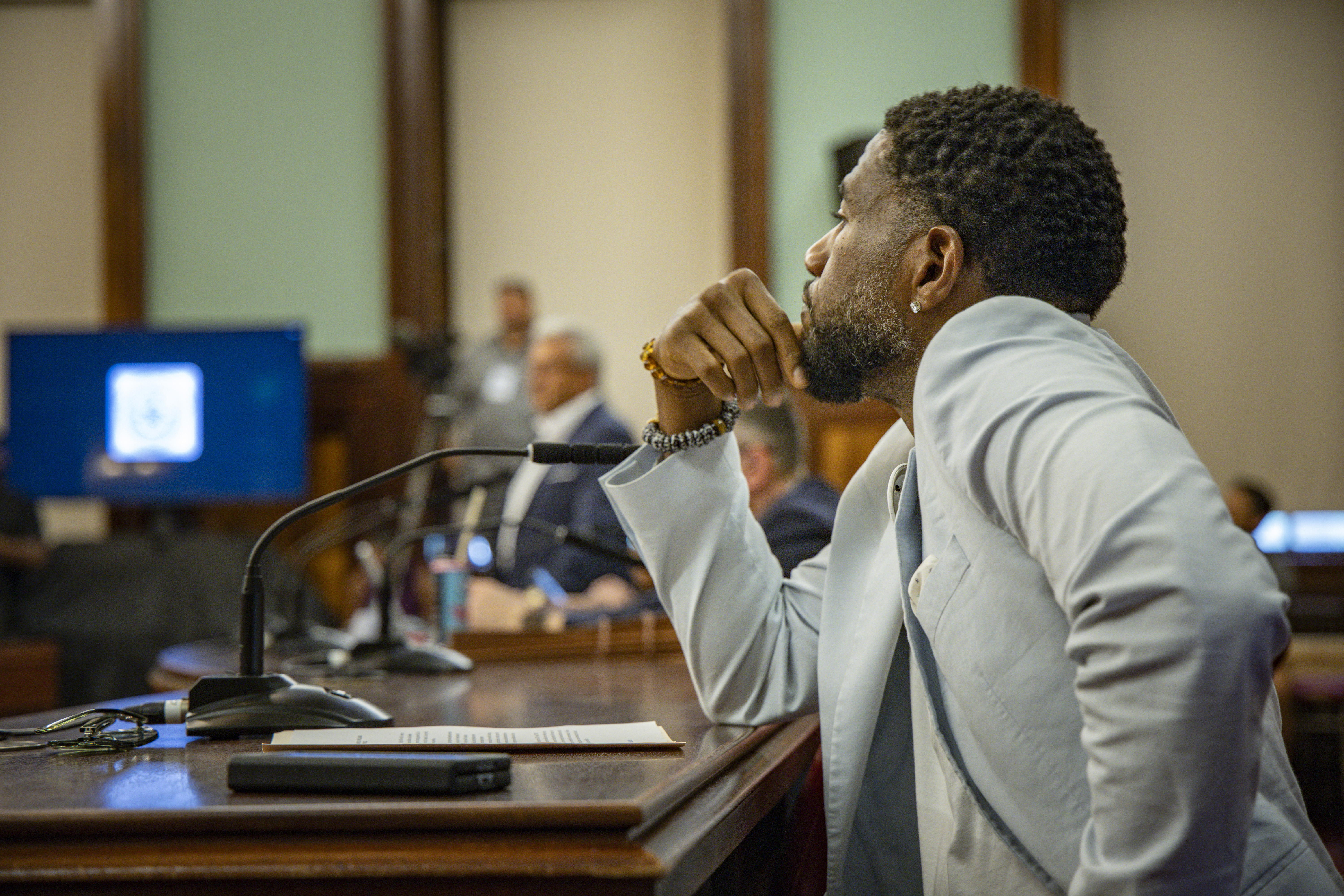The City of New York seal encased in a larger blue circle with the words "Public Advocate: City of New York"